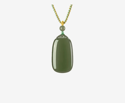 This natural Hetian jade pendant, symbolizing peace and safety, is a couple's design, certified, and highly collectible.