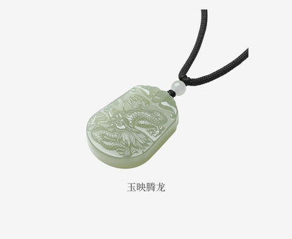 This natural Hetian jade pendant, symbolizing peace and safety, is a couple's design, certified, and highly collectible.