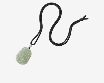 This natural Hetian jade pendant, symbolizing peace and safety, is a couple's design, certified, and highly collectible.